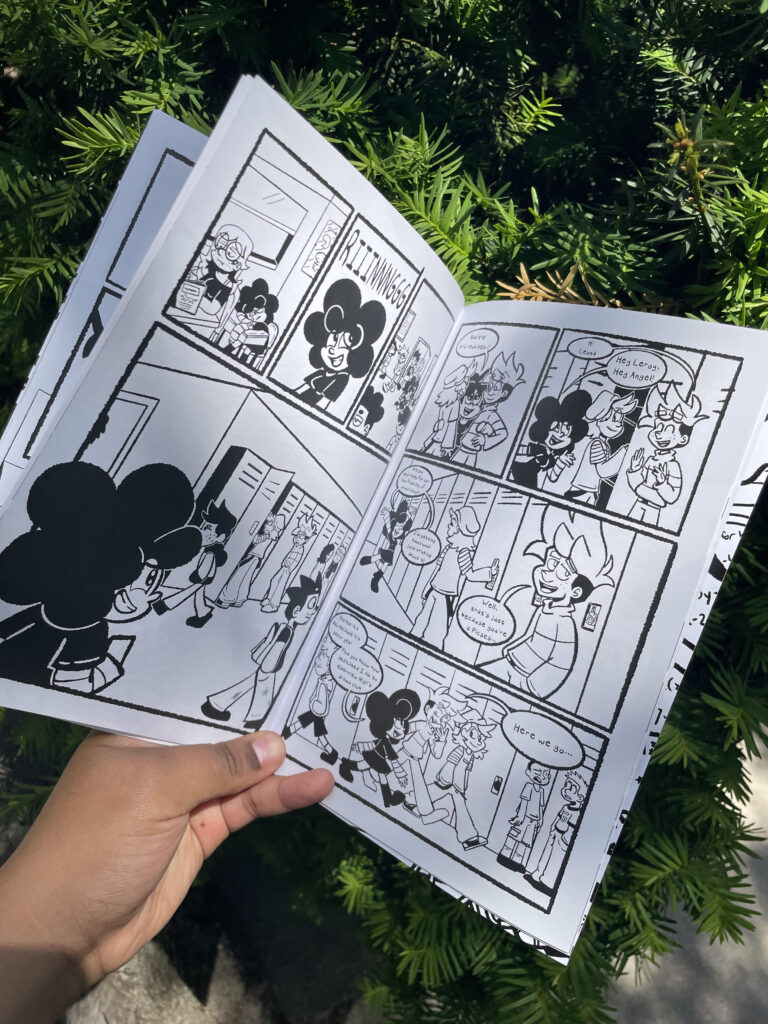 Photo of two interior pages of Senior Year Issue One by Asia Steele.